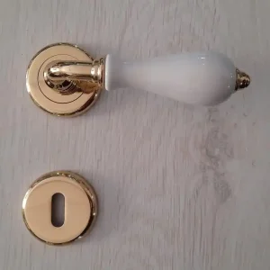 Maniglia per porta MARTA ottone lucido porcellana bianca Poggi e Mariani 7246 Direct Verzonden